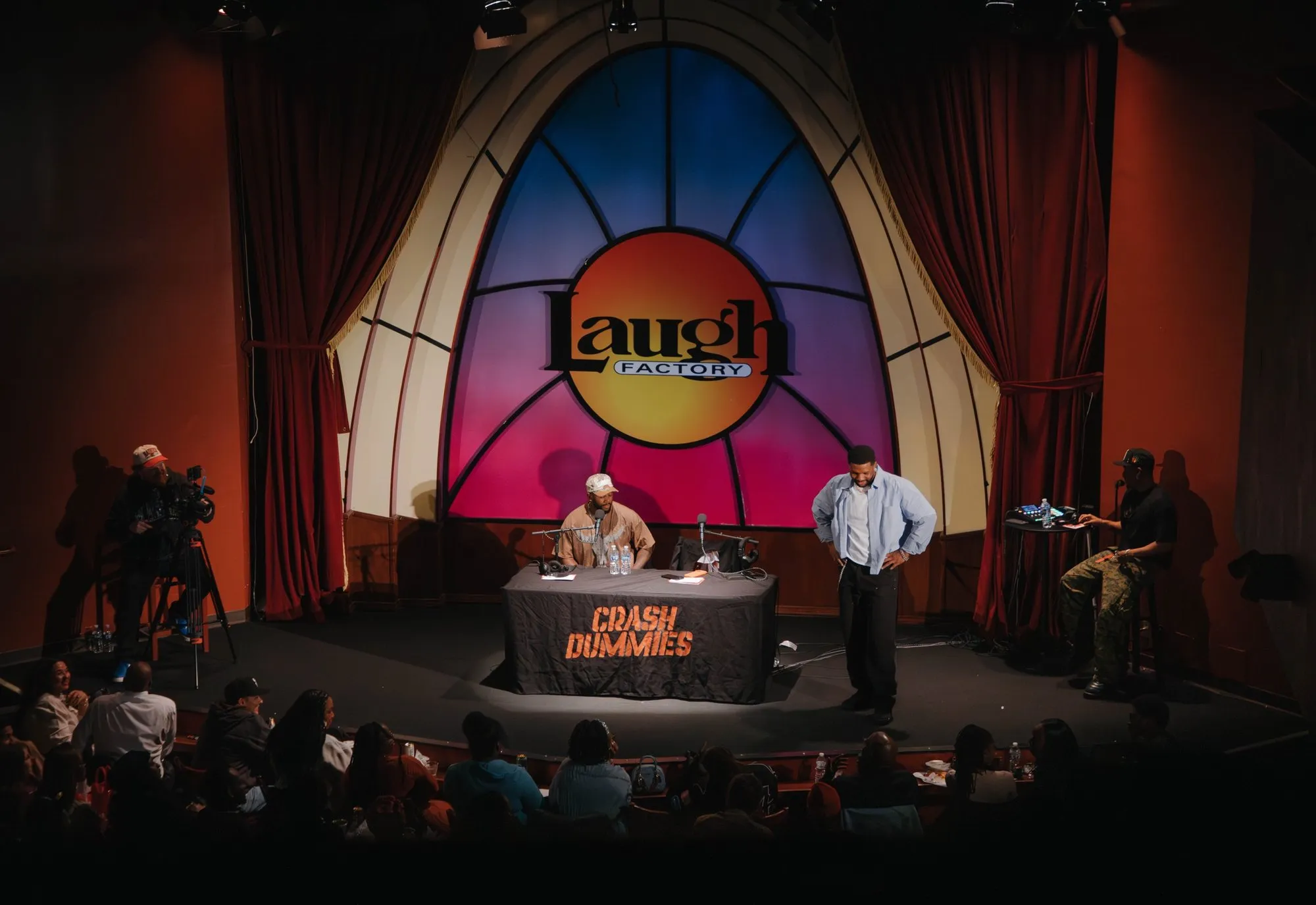 Mike and Pat at the Crash Dummies desk on the Laugh Factory Chicago stage