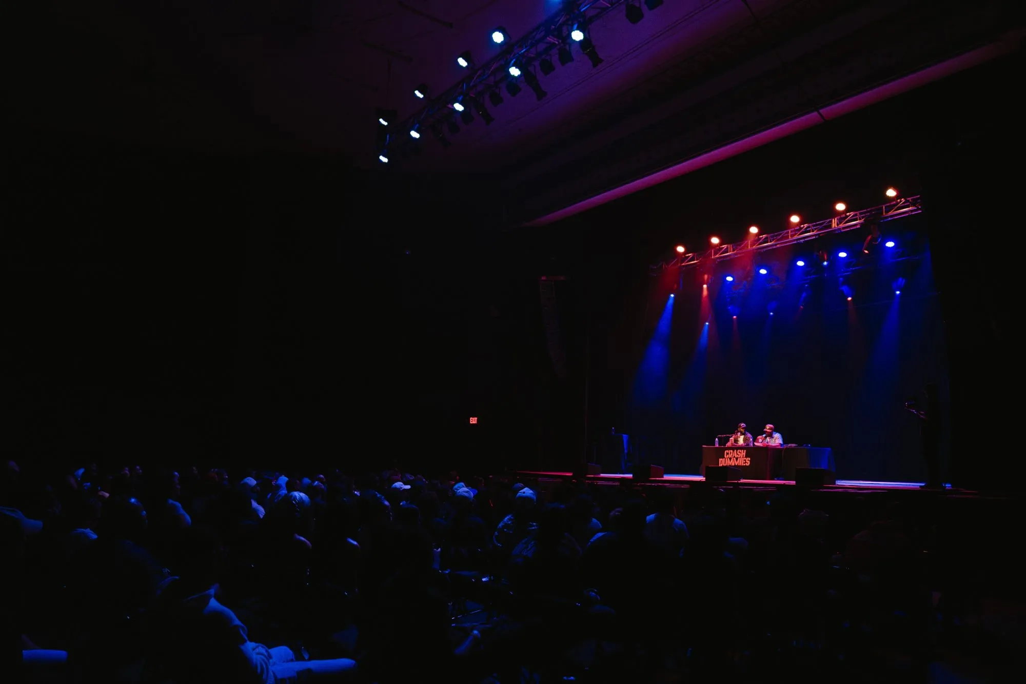 Side view of the stage and the packed theater