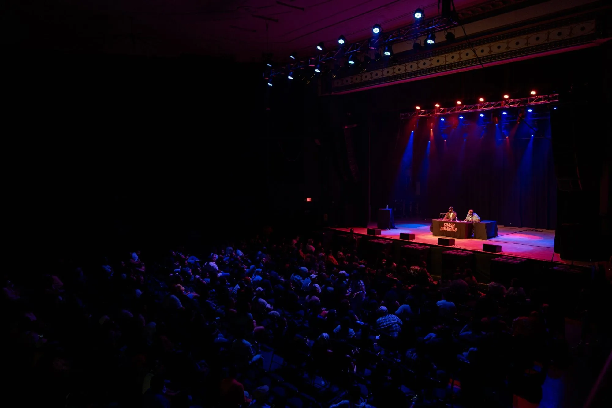High-angle view of the full room facing the stage