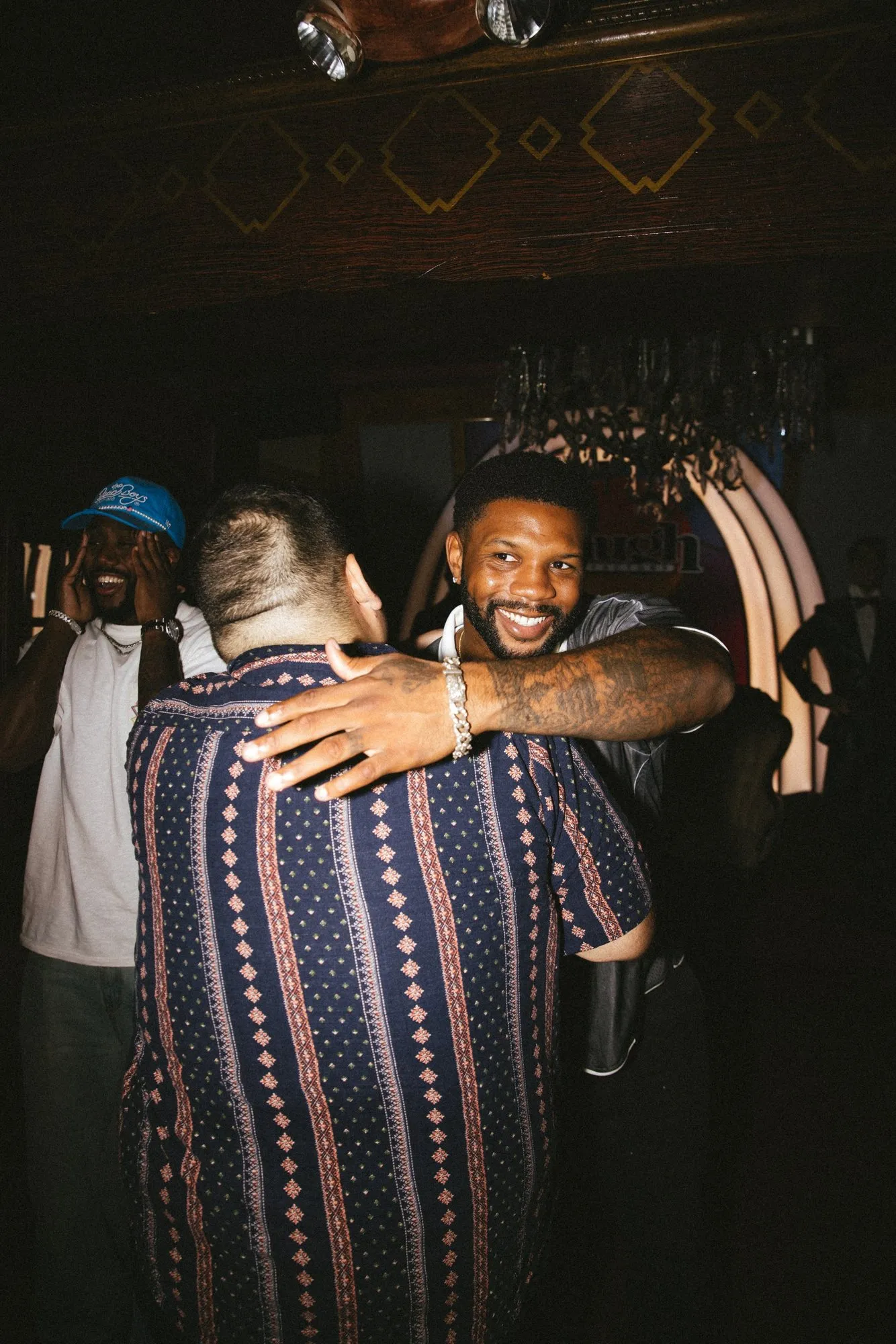 A big hug with a fan after the show